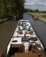 Our friends' beautifully-restored 100 year old luxury barge - just for you!