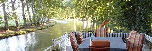 Luxury cruise of the Canal du Midi, historic European river barge, South of France, private owners